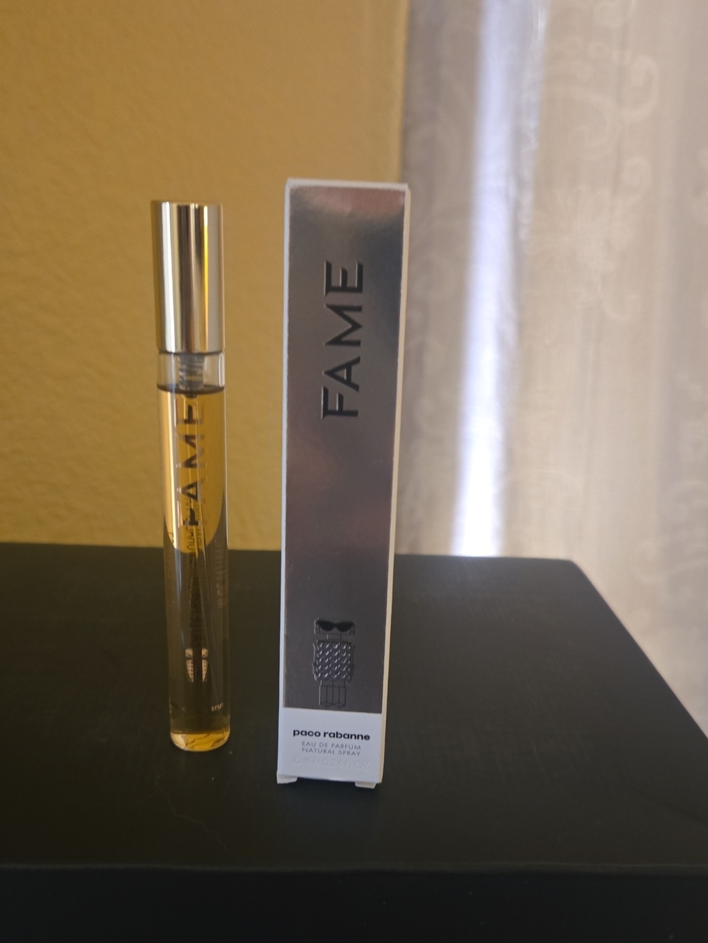 Paco Rabanne FAME Travel Spray in Gold and Silver